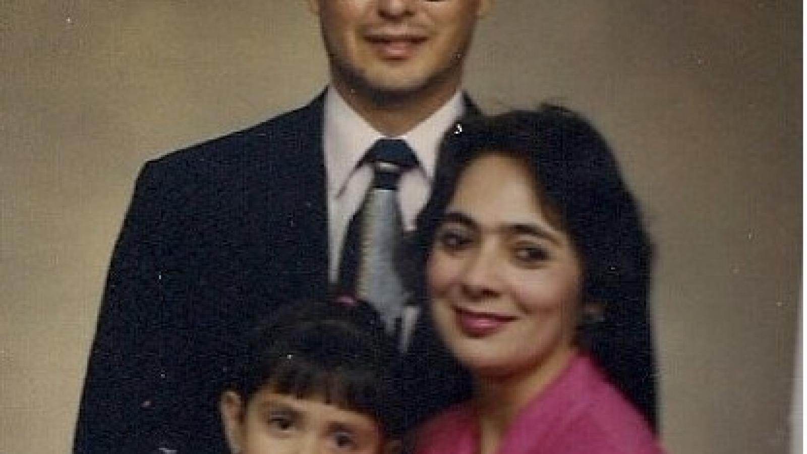 Young Laura with her parents